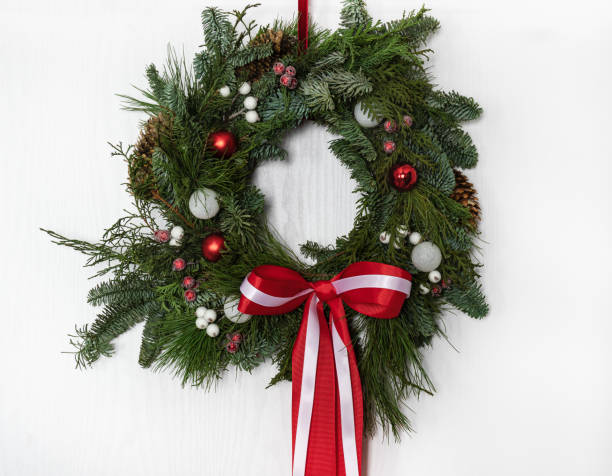 istock Christmas wreath with white balls, decorative frozen berries 1343313394