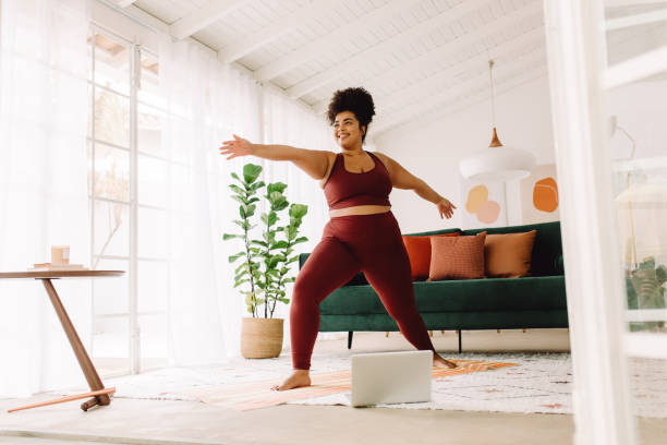 istock Healthy woman training at home 1343321344