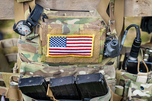 equipment of a professional soldier, with the American flag in the center