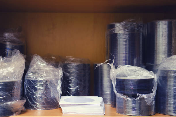 istock A stack of CD and DVD discs in a package on the shelf 1343336472
