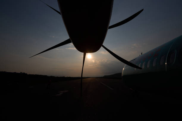 istock Aircraft propeller. Outside view. Sunset and plane 1343339775