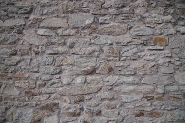 Old stone exterior wall in western ghost town of Virginia City, Montana in western USA.
