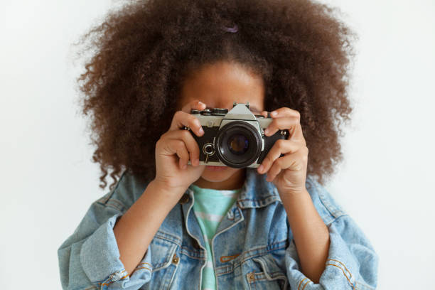 istock Lovely girl with a camera 1343344208