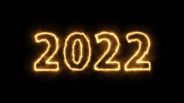istock 2022 inscription with sparklers on a black background. 1343344850