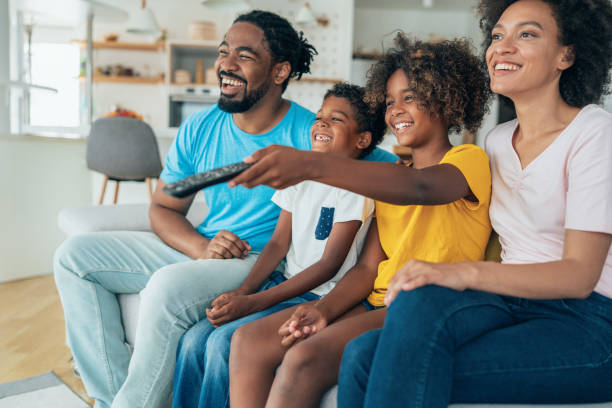 istock Family watching television 1343350561