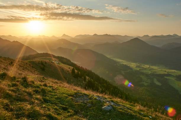 istock Scenic sunrise above a mountain range in the alps. 1343363950
