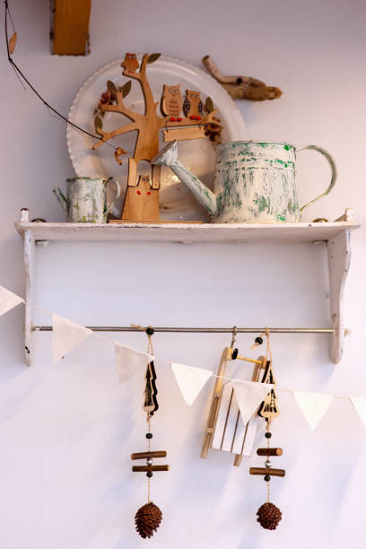 istock White shelf with two metal painted watering heads 1343374186