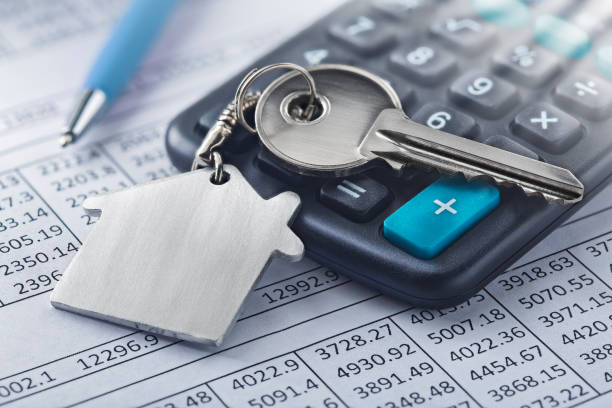 House key lying down on a calculator