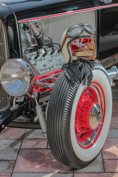 istock Old vintage car with helmet 1343391741