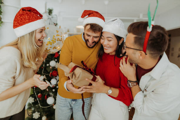 istock Friends celebrating Christmas 1343393331