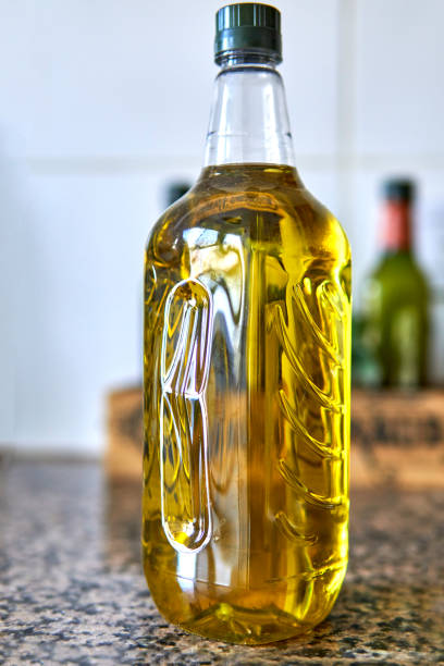 istock Olive Oil Bottle Close-up in the kitchen selective focus vertical 1343399072