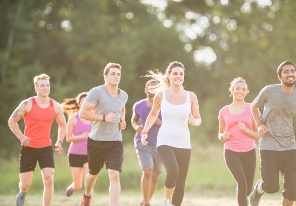 istock Running Outside as a Group on a Sunny Summer Day 1343399913