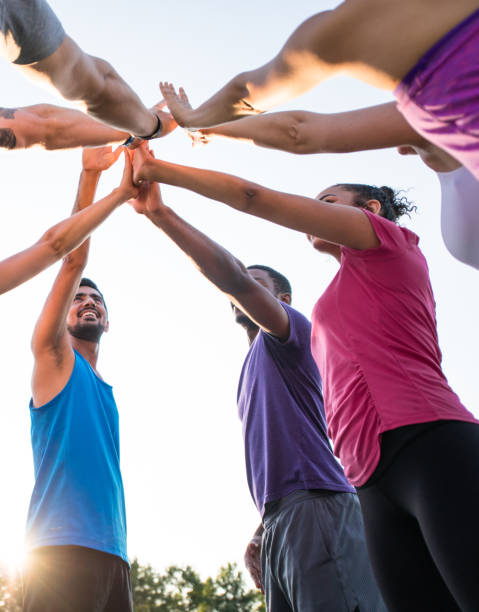 istock Sports Group Huddle Outside 1343399925