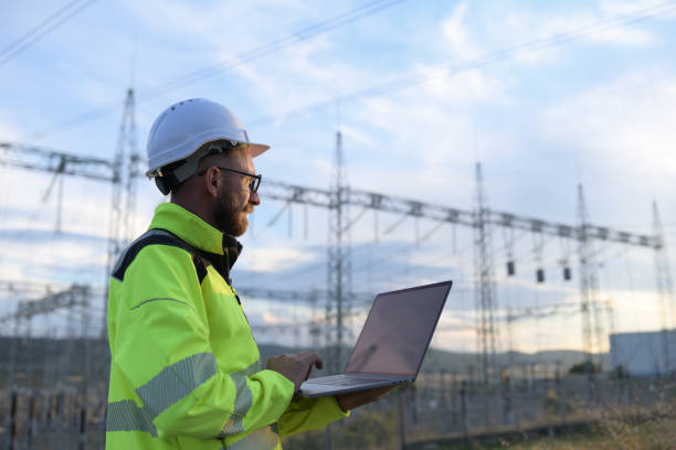 istock Confident Young Engineer Using Laptop In Electric Power Station 1343403882