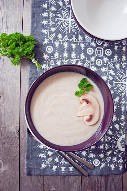 Potato cream soup with champignons