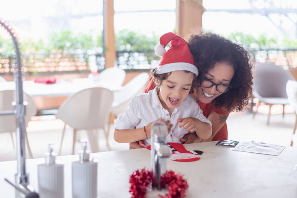 istock Mother and son celebrating Christmas at home 1343405079