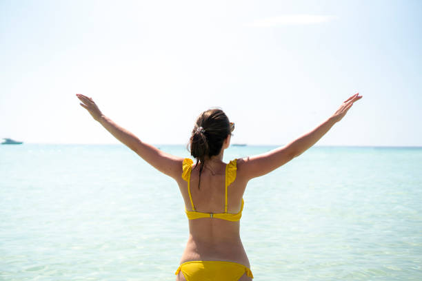 istock young person chilling on the summer ocean beach 1343405978