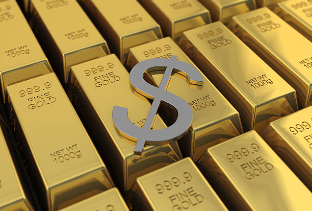 istock Gold Bars and currency symbol 134340659