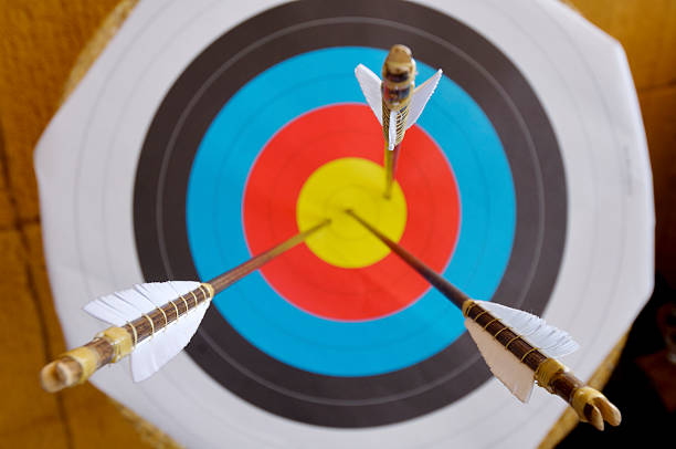 istock Colorful target with three arrows piercing bulls eye 134341335