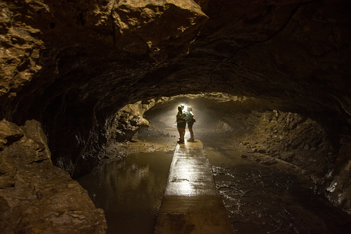 Maquoketa Caves State Park - Three Hikers Examine Side Passage