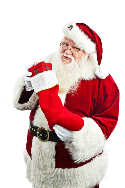 istock Santa claus holding stocking with a present inside 134343527