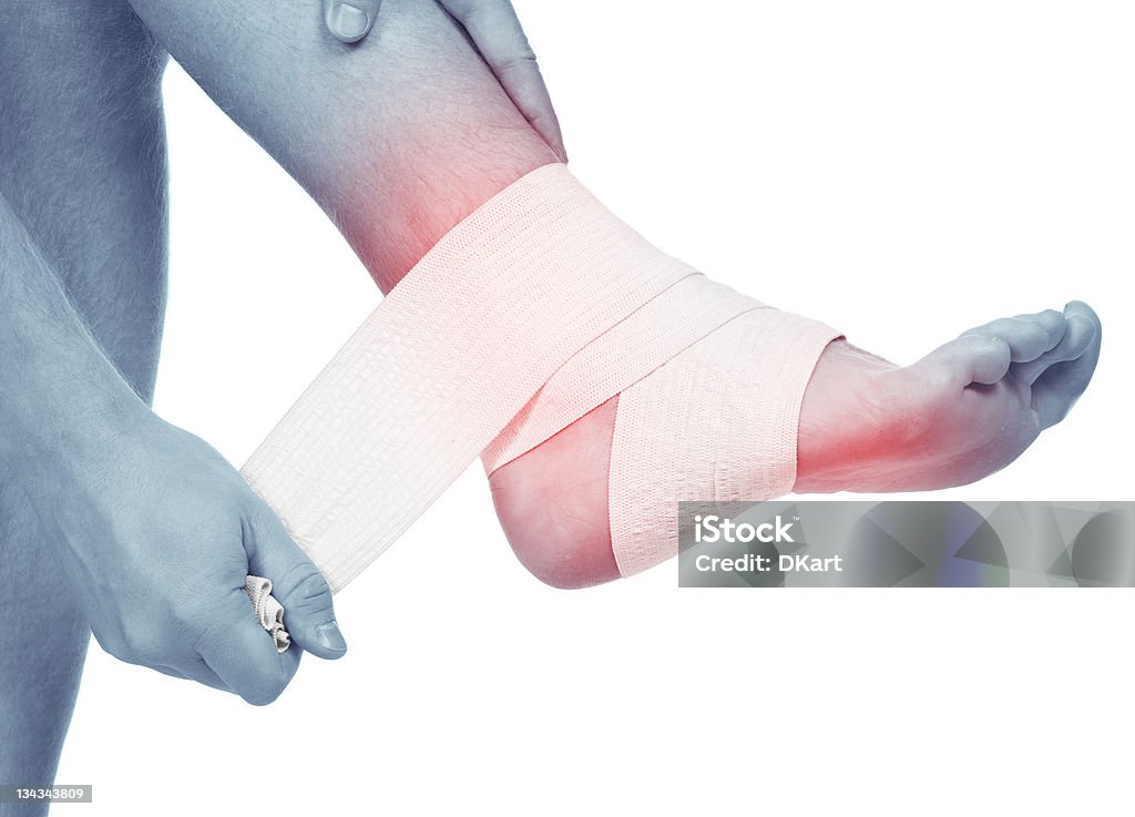 Sports traumatismo de a pie. Sprained tobillo - Foto de stock de Dolor libre de derechos