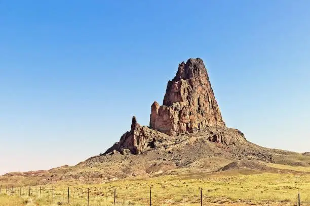 Huge Rock Outcropping Overlooking Valley In High Desert