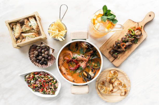 mixed spanish gourmet tapas sharing set selection on restaurant table in barcelona