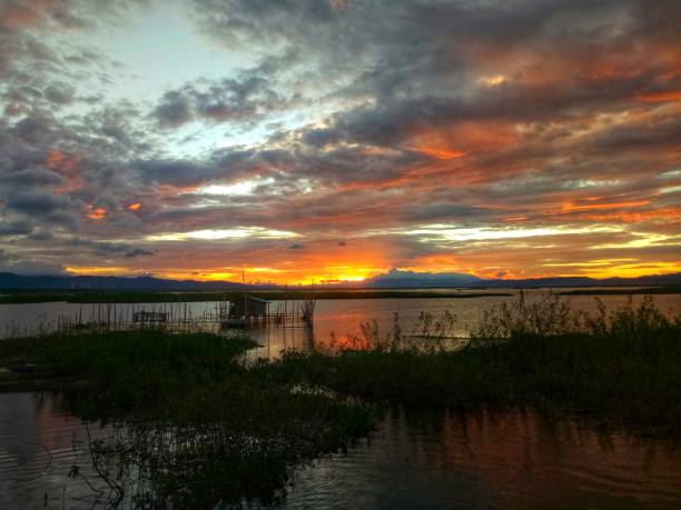 istock sunset on lake Limboto, Gorontalo 1343444763
