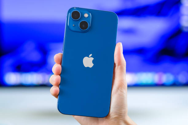 iPhone 13 in blue iPhone 13 in blue. Manhattan, New York, USA September 26, 2021. iphone 13 photos stock pictures, royalty-free photos & images