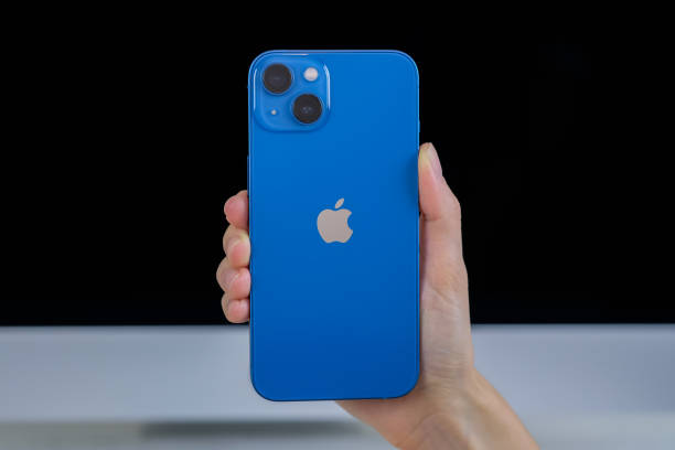iPhone 13 in blue iPhone 13 in blue. Manhattan, New York, USA September 26, 2021. iphone 13 photos stock pictures, royalty-free photos & images