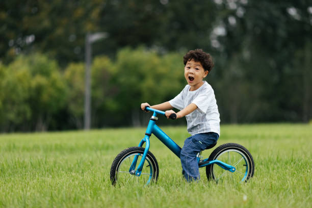 istock A little boy riding a bicycle 1343451112
