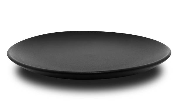 istock Black circle ceramics plate isolated on white background. 1343451305