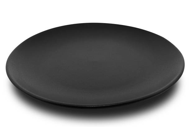 istock Black circle ceramics plate isolated on white background. 1343451319