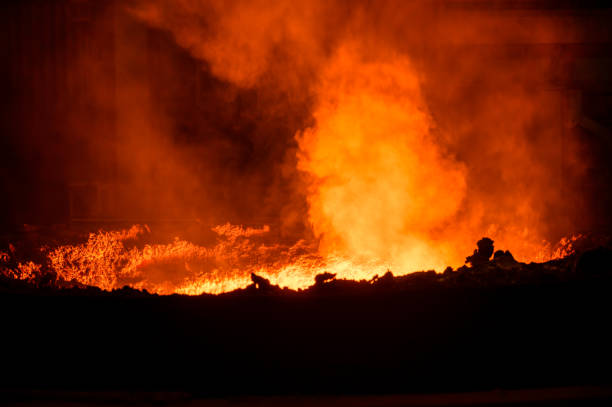 istock Boiling molten metal in a metallurgical ladle 1343456059