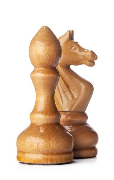 istock Wooden chess pieces close up isolated on white 1343467855