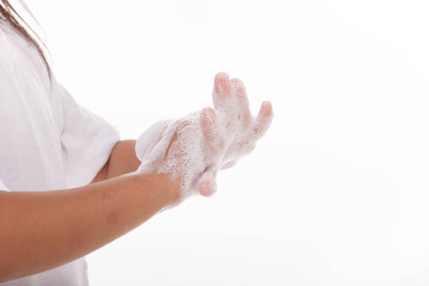 istock little girl hand washing hands,on white background 1343467859