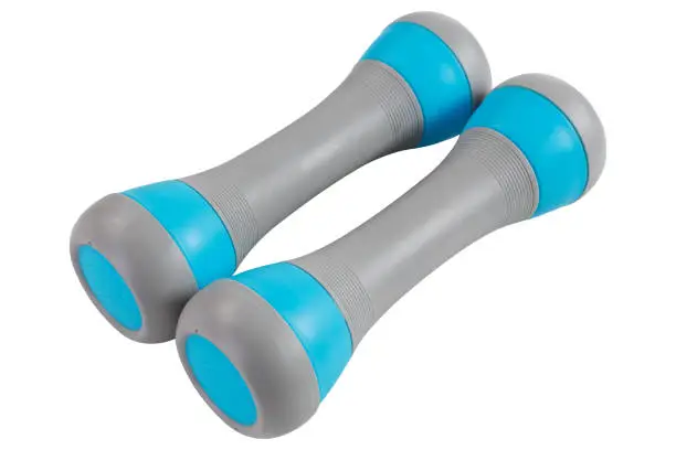 Photo of a pair of dumbbells with turquoise inserts, in a plastic sheath, on a white background