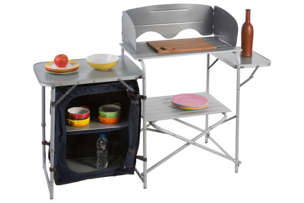 istock aluminum folding camping table consisting of two sections, with a set of utensils, on a white background 1343468566