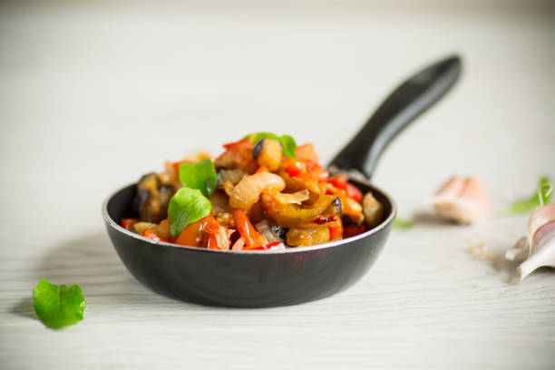 istock fried eggplants with peppers, tomatoes, onions and garlic 1343469822