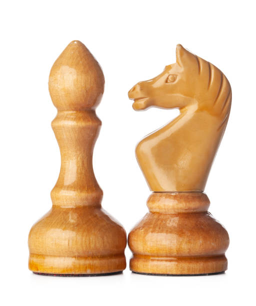 istock Wooden chess pieces close up isolated on white 1343469835