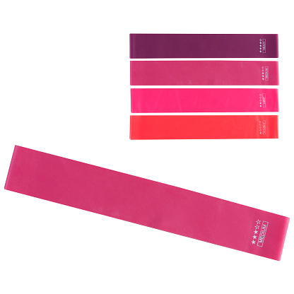 set of ring fitness resistance bands, in the foreground a lilac ribbon, as the main position, medium effort, on a white background, isolate