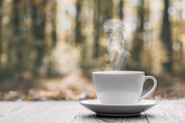 istock hot coffee on the table on a autumn background 1343472987
