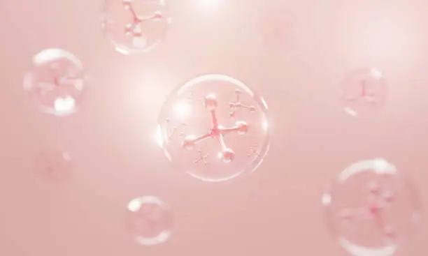 Photo of molecule inside bubble on pink background,