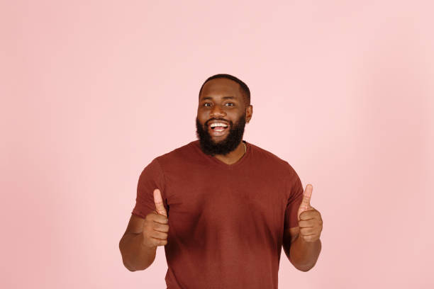 istock Excited black person actor shows thumbs-up posing for camera 1343478810
