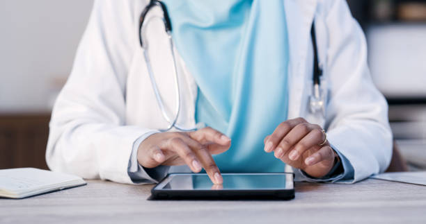 istock Shot of a female doctor using her digital tablet 1343480547