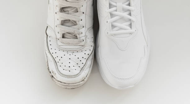 istock old and new white sneakers with laces on a white background. isolate. 1343488215