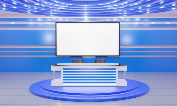 istock white table on stand with 3 led screen background in a news studio room.3d rendering. 1343489330