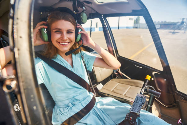 istock Pleased Caucasian airwoman getting ready for flight 1343492054