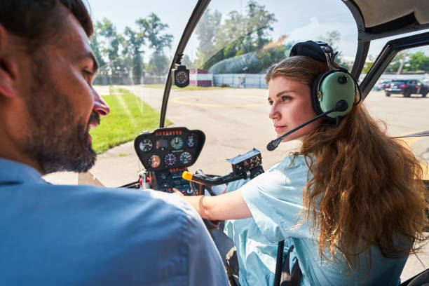 istock Female student pilot taking aviation lesson with private tutor 1343492106